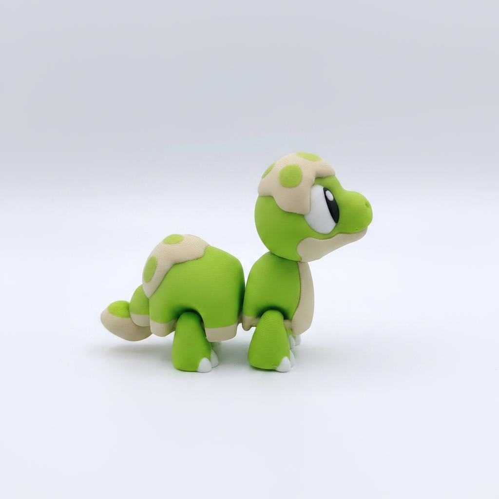 Dino Baby Articulado Eco-Friendly Premium | Figura Coleccionable Biodegradable | Ziggys